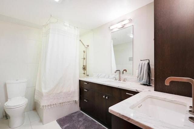 full bath with vanity, a shower with shower curtain, toilet, and tile patterned flooring