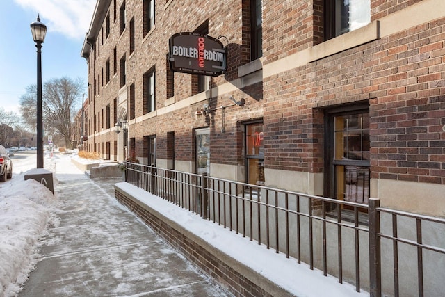 view of snow covered property