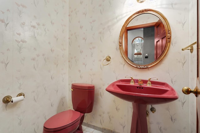 bathroom featuring toilet