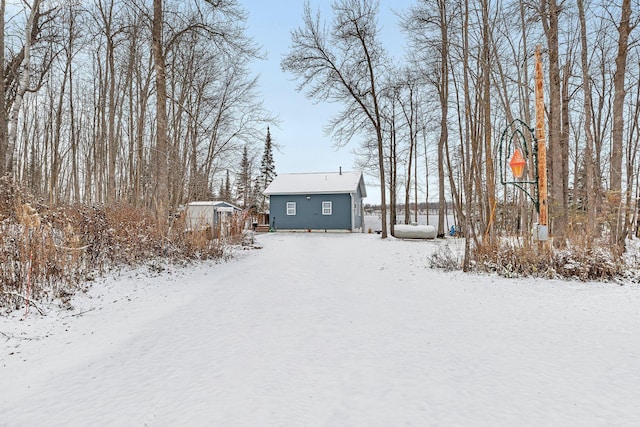 view of yard covered in snow