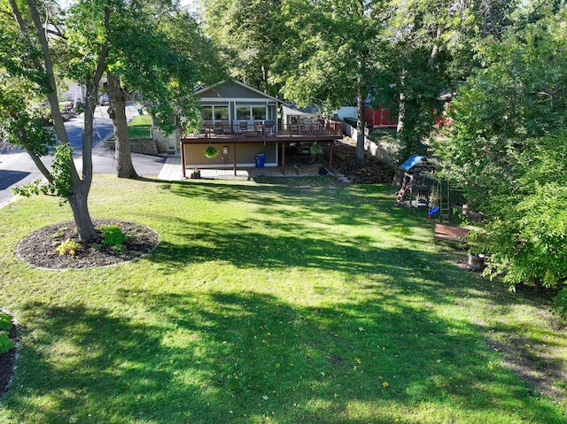 view of yard with a deck