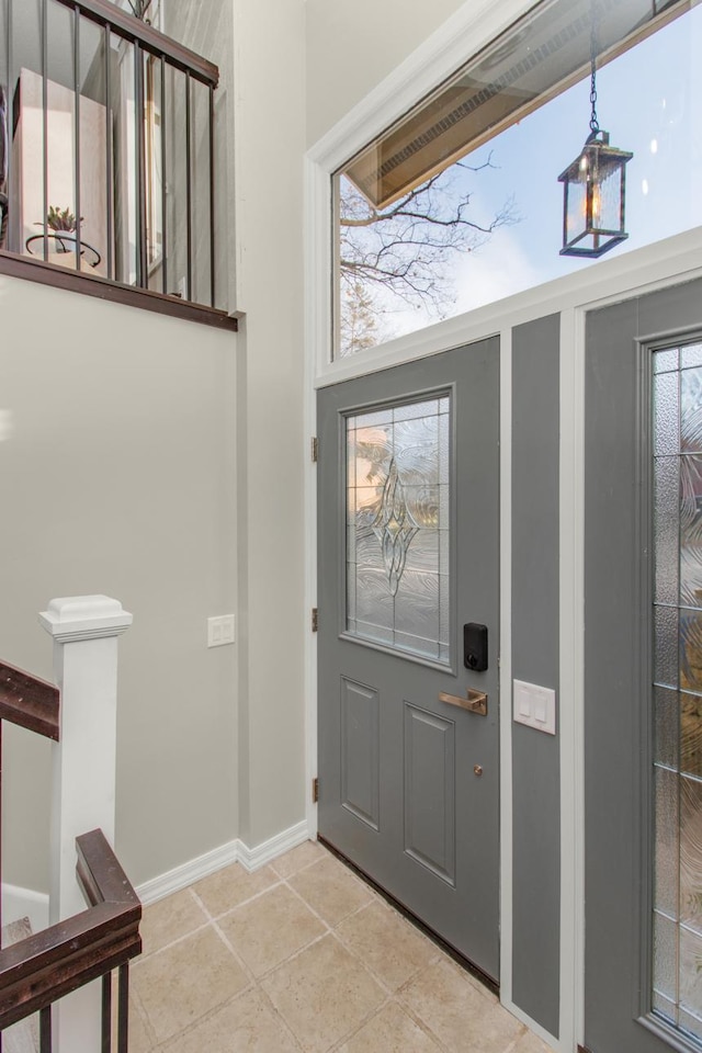 entryway with tile patterned floors