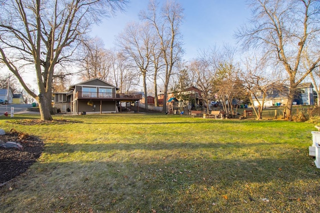 view of yard featuring a wooden deck