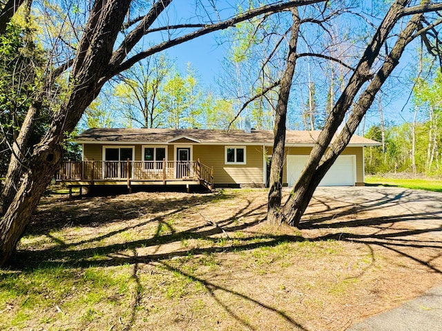40308 County Road 3, Fifty Lakes, MN 56448 - ranch-style home with driveway, an attached garage, and a deck