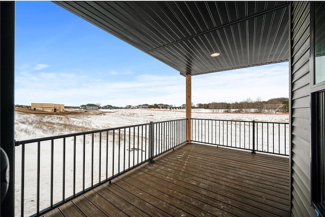 view of snow covered deck