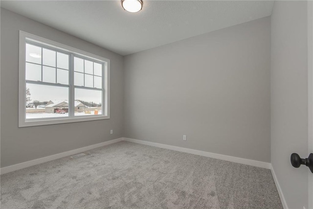 view of carpeted spare room