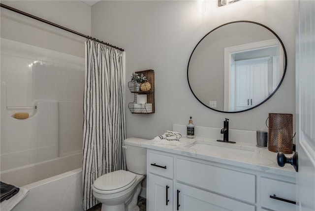 full bathroom featuring vanity, shower / bath combo, and toilet