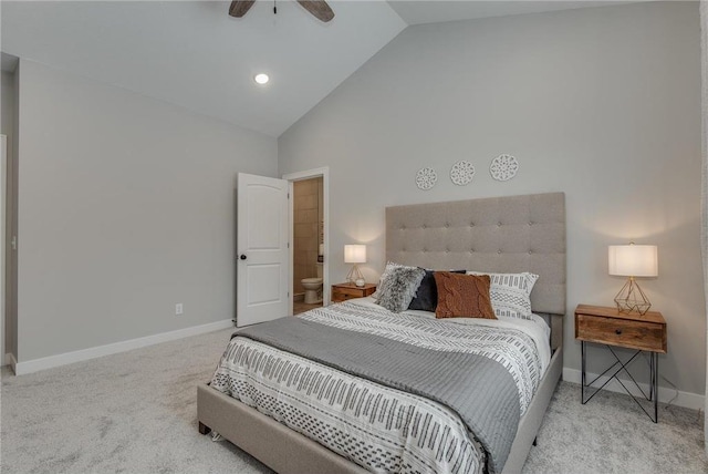 bedroom with connected bathroom, ceiling fan, carpet, and high vaulted ceiling