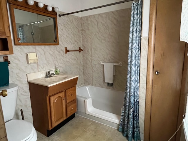 full bathroom featuring shower / bath combo, vanity, and toilet