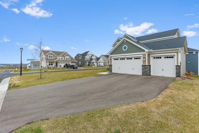 exterior space with a front lawn and a garage