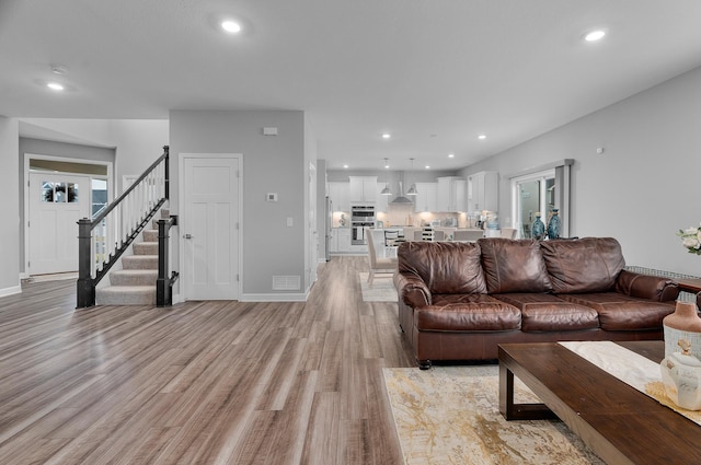 living room featuring light hardwood / wood-style flooring