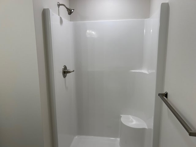 bathroom featuring a shower