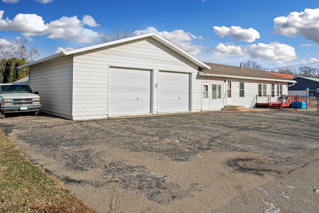 exterior space featuring a garage