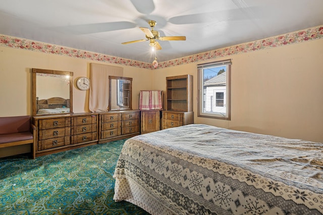 bedroom featuring dark colored carpet and ceiling fan