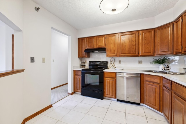 kitchen featuring stainless steel dishwasher, a textured ceiling, sink, and black / electric stove