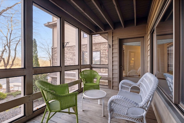 sunroom / solarium with beam ceiling