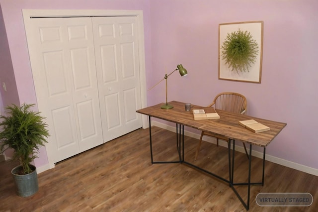 home office with dark wood-type flooring