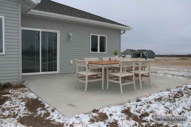 view of snow covered patio