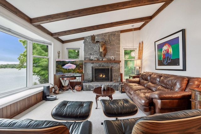 carpeted living room featuring a fireplace, vaulted ceiling with beams, a water view, and wood walls