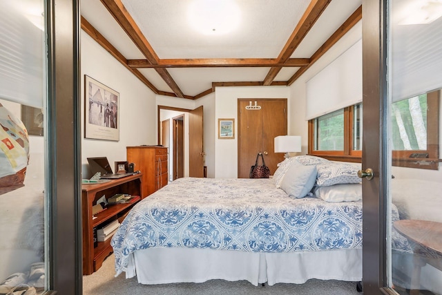 carpeted bedroom featuring beam ceiling and coffered ceiling