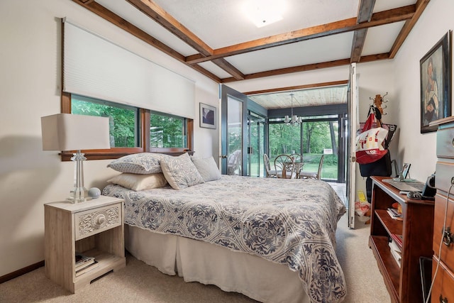 bedroom featuring beamed ceiling, light carpet, access to exterior, and an inviting chandelier