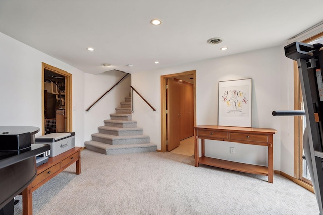 interior space featuring light colored carpet