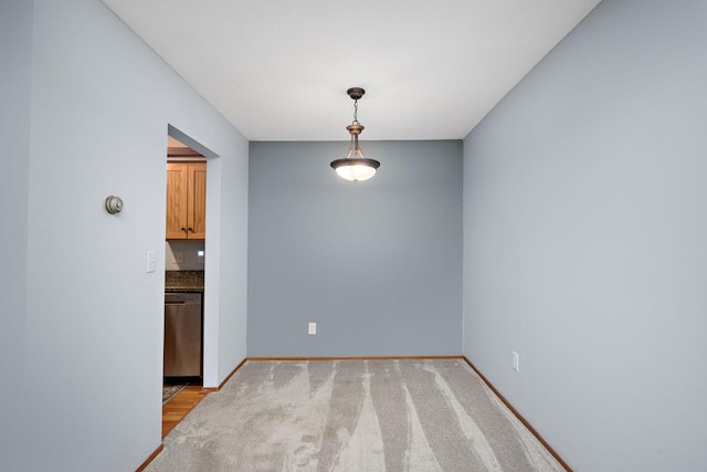 unfurnished dining area with light hardwood / wood-style floors