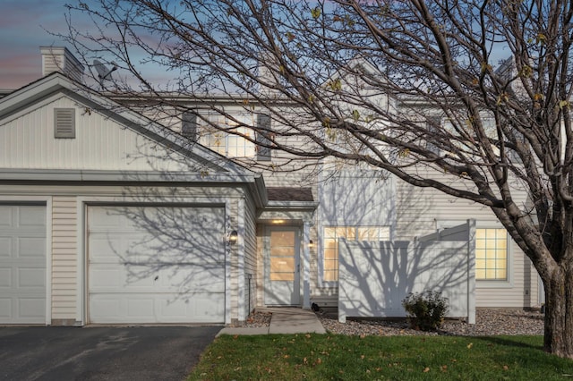 view of front of house with a garage