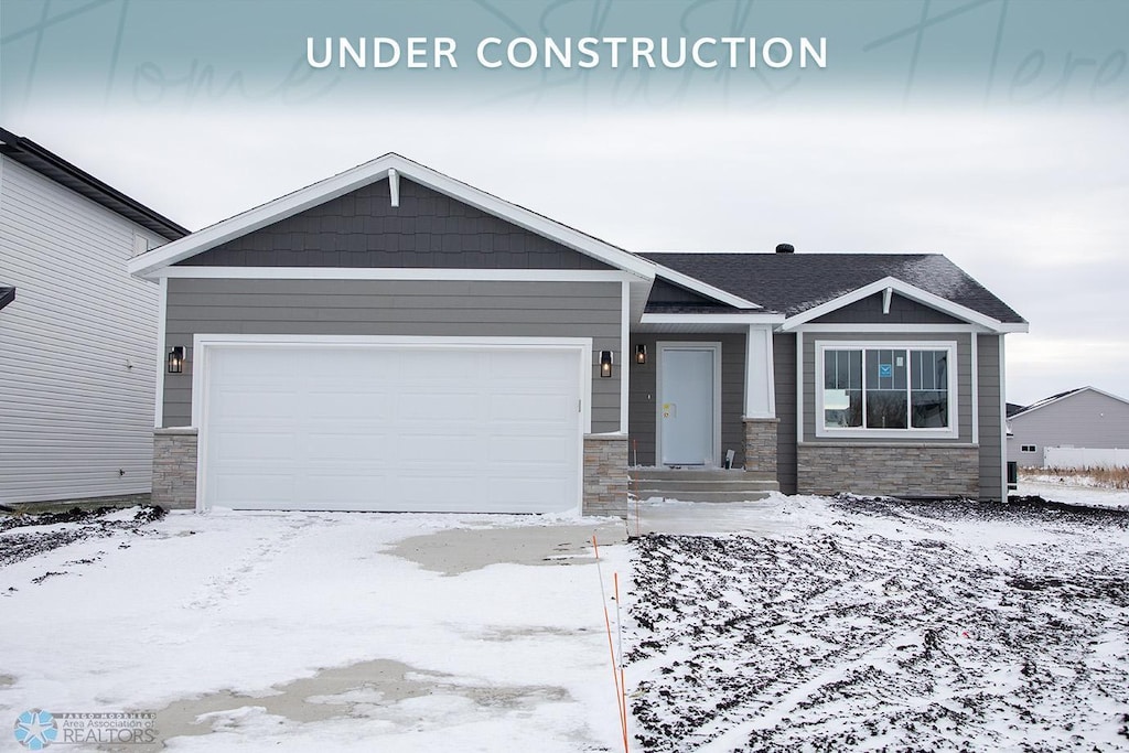 craftsman inspired home featuring a garage