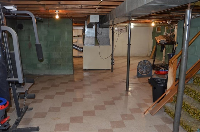 basement featuring heating unit