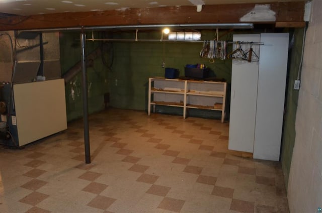 basement featuring heating unit