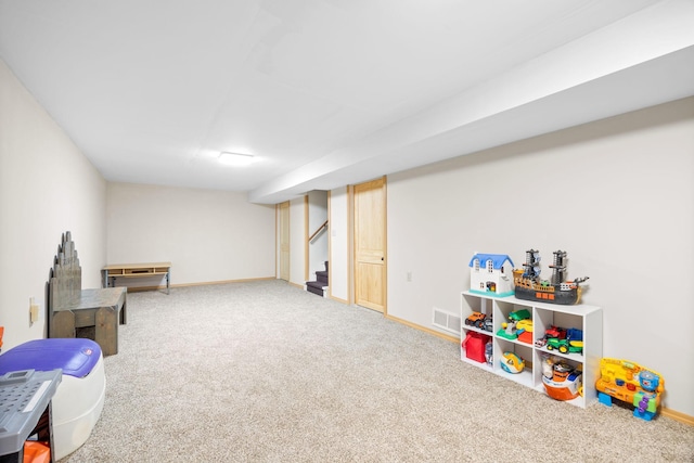 game room featuring carpet floors, visible vents, and baseboards