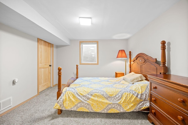 bedroom featuring carpet, visible vents, and baseboards