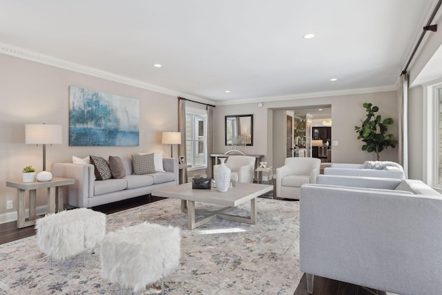 living room featuring ornamental molding and hardwood / wood-style floors