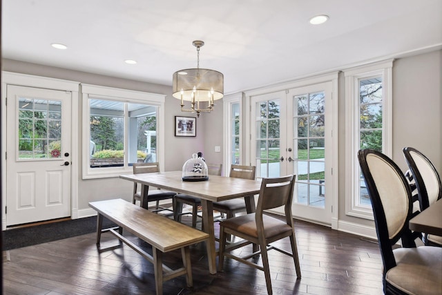 dining space featuring dark wood-type flooring and french doors