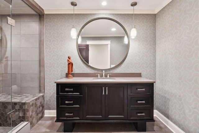 bathroom featuring crown molding, vanity, a baseboard heating unit, and hardwood / wood-style flooring