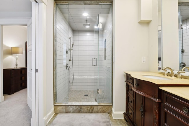 bathroom with vanity and walk in shower