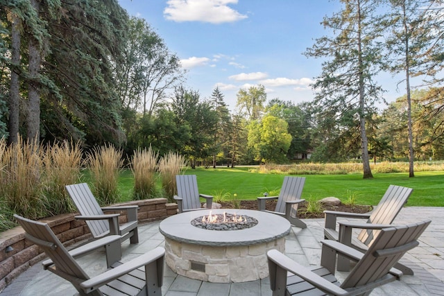 view of patio / terrace with an outdoor fire pit