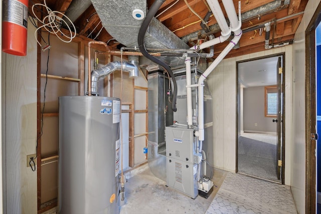 utility room with heating unit and gas water heater