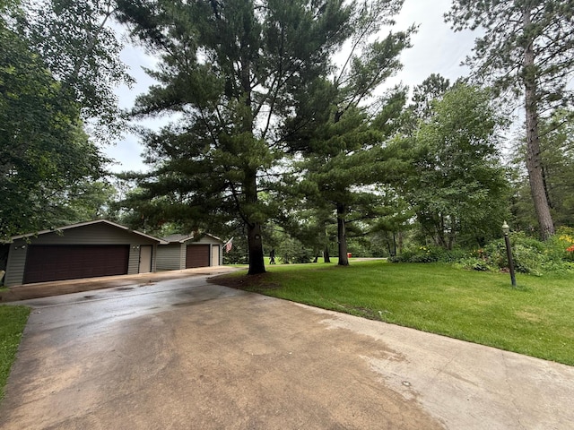 3929 County Road 17, Pequot Lakes, MN 56472 - view of front of property with an outdoor structure, a garage, and a front yard