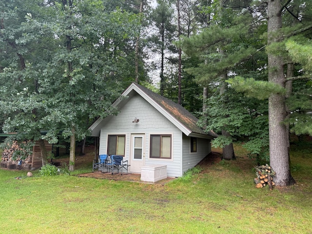 3929 County Road 17, Pequot Lakes, MN 56472 - rear view of property with a yard