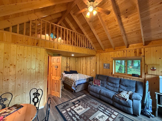 3929 County Road 17, Pequot Lakes, MN 56472 - bedroom with wood finished floors, wood walls, a wooden ceiling with exposed beams, and high vaulted ceiling