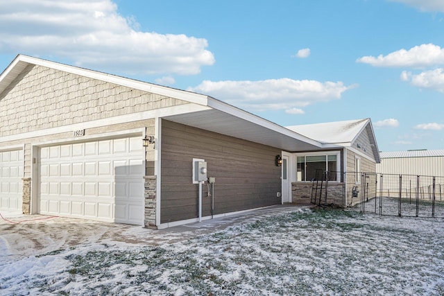 view of front of property featuring a garage