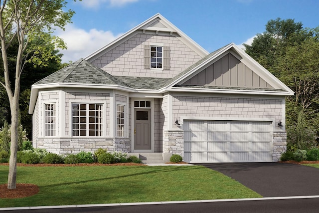 view of front facade with a garage and a front lawn