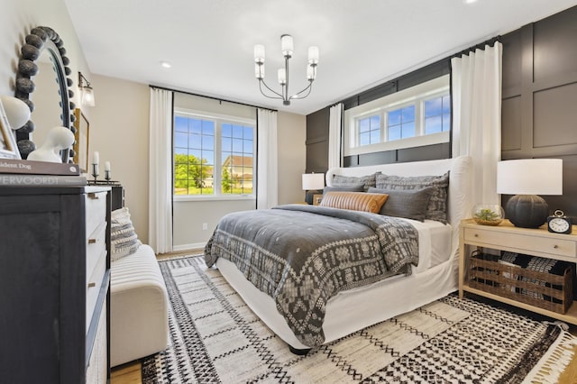 bedroom featuring a chandelier