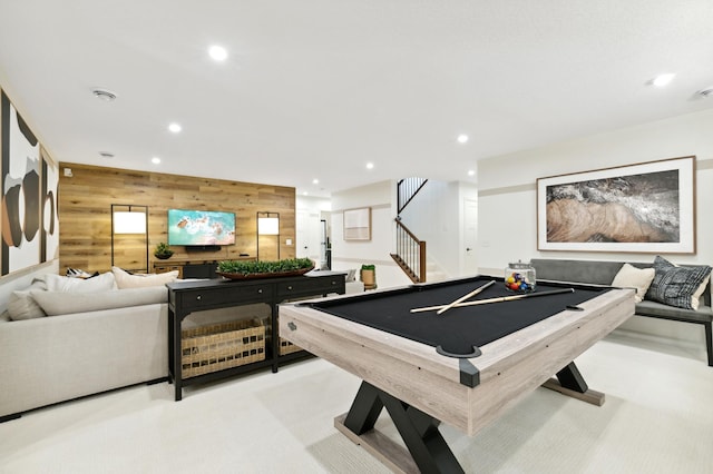 rec room with light colored carpet, wooden walls, and pool table