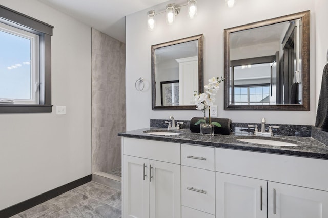 bathroom with vanity and walk in shower