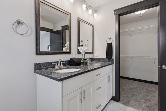 bathroom featuring vanity and a textured ceiling