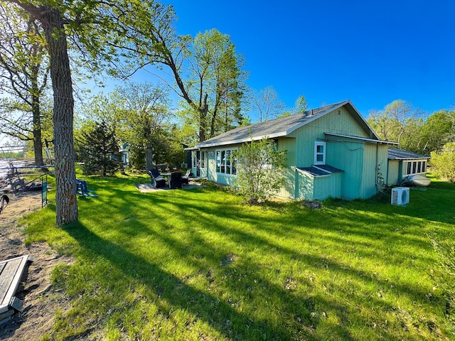 42536 Pleasure Park Rd, Ottertail, MN 56571 - view of home's exterior featuring a yard