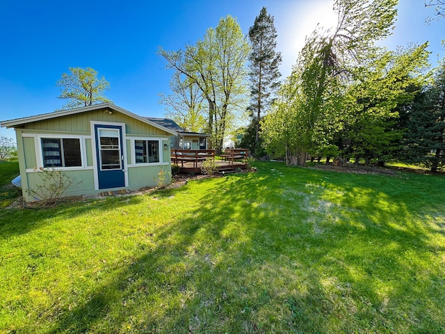 42536 Pleasure Park Rd, Ottertail, MN 56571 - view of green lawn featuring a deck